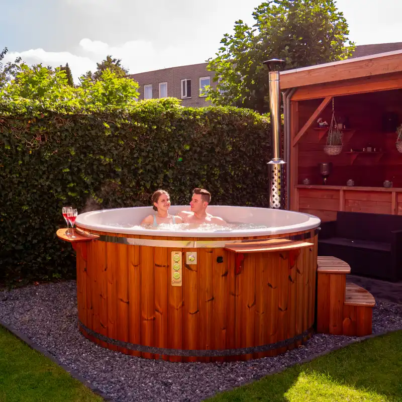 Hybride houtgestookt hottub XXL extern en intern kachel van Qrest